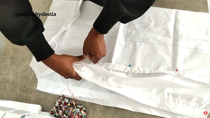 7 simple steps to make this cute diy ruched top, Hemming the bottom of the DIY ruched top
