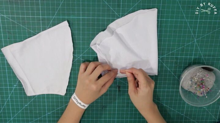 how to easily make a cute diy peasant top from a t shirt, Pinning the sleeves ready for sewing