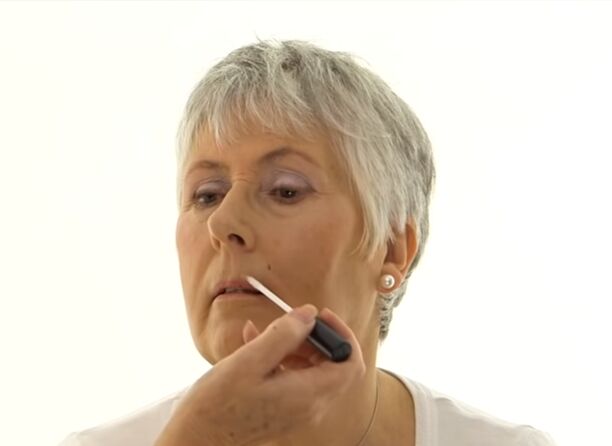 how to perfectly apply eye makeup for older women with glasses, Applying a lip primer before lipstick