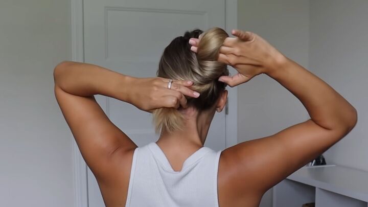 how to tie your hair without a hair tie 4 different cute ways, Twisted the hair into a bun