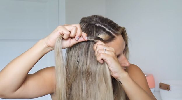 4 gym hairstyles for long hair that are cute easy to do stay secure, Braiding hair in a French three strand braid