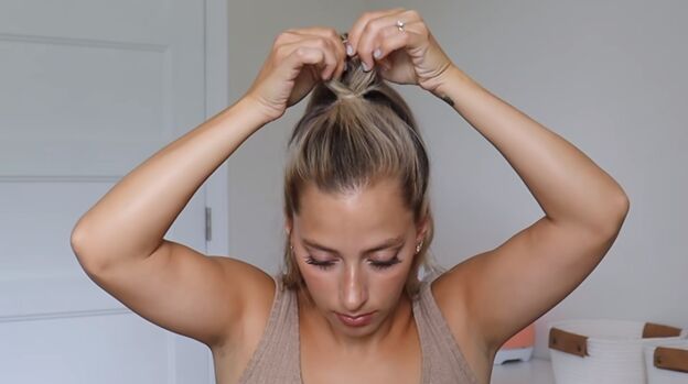 4 gym hairstyles for long hair that are cute easy to do stay secure, Creating a hole in the hair