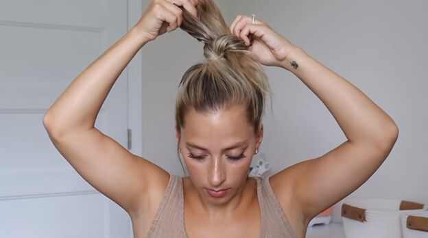 4 gym hairstyles for long hair that are cute easy to do stay secure, Pulling hair through itself