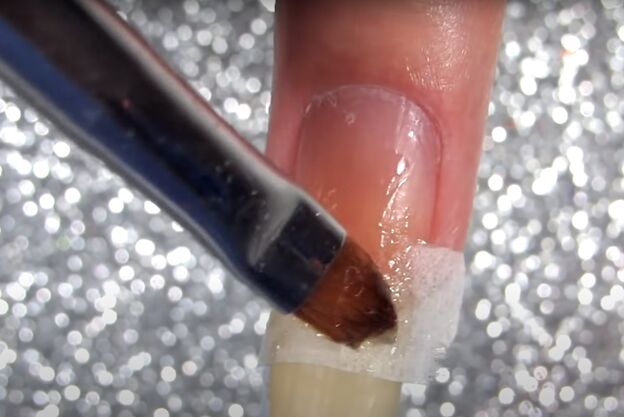 how to easily fix a badly broken nail with a teabag some superglue, How to glue back a broken nail