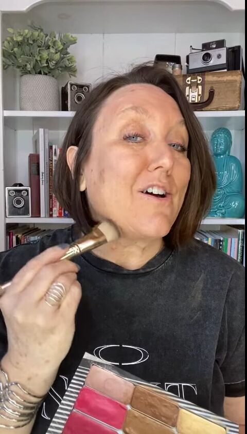 how to create fun colorful makeup looks for mature skin, Applying bronzer for a glow