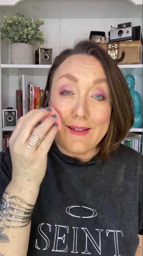 how to create fun colorful makeup looks for mature skin, Setting makeup with a spray and sponge