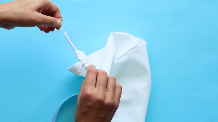 how to sew a diy bonnet for the ultimate handmaid s tale costume, Inserting ribbon through the casing