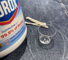 She poured bleach into a cup, then grabbed a few Q-tips to do something incredible to her jacket