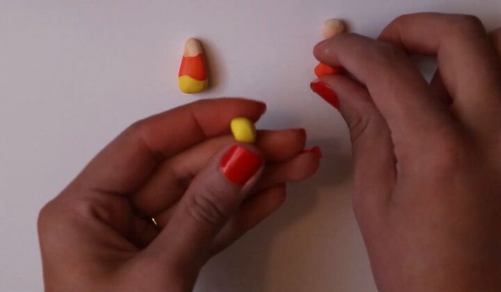 4 easy polymer clay halloween ideas for cute but spooky earrings, Making DIY candy corn earrings for Halloween