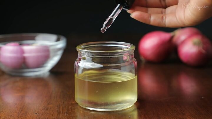 how to make onion oil for hair for fast hair growth a healthy scalp, Adding drops of essential oils to onion oil