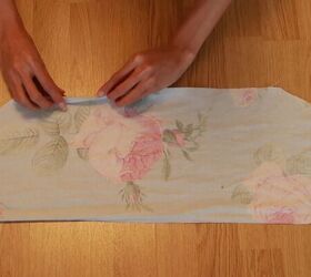 how to make a gorgeous floral diy dress out of an old blanket, Hemming the edges of the bodice fabric