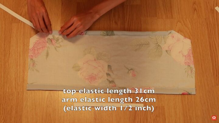 how to make a gorgeous floral diy dress out of an old blanket, Inserting the elastic into the fabric tunnel