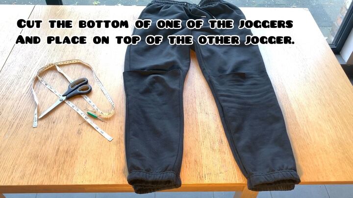 how to make trendy diy stacked pants out of 2 pairs of sweatpants, Cutting of the bottom of the sweatpants