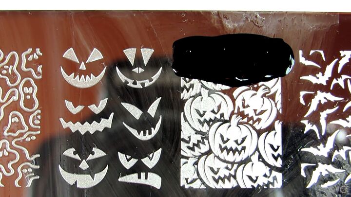 how to use halloween nail stamping plates for fast easy nail designs, Pumpkin Halloween nail stamps