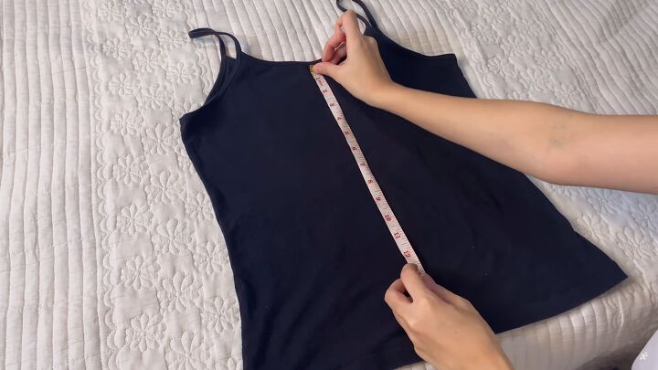 how to easily upcycle tank tops t shirts to make cute diy crop tops, Measuring the tank top to upcycle
