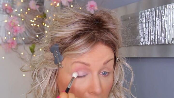 simple makeup for droopy hooded eyes you can take from day to night, Applying eyeshadow at the crease