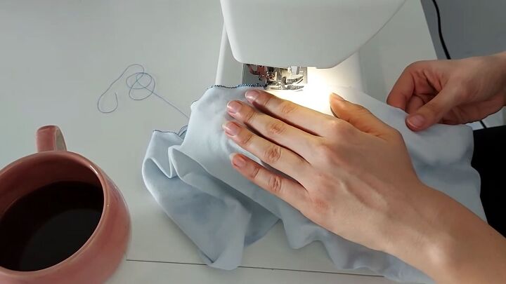 how to make a pretty milkmaid top out of an old t shirt, Hemming with an overlock stitch