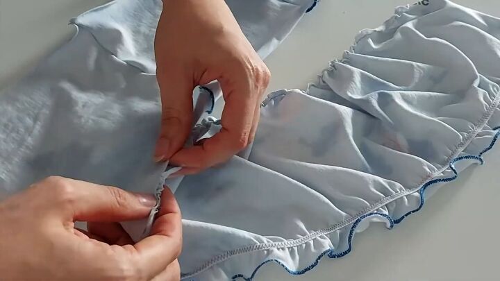 how to make a pretty milkmaid top out of an old t shirt, Pinning the fabric pieces together