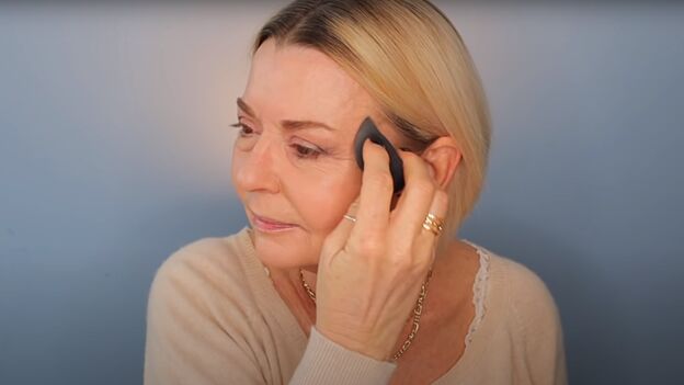 applying fancy makeup for mature skin is the price worth it, Applying foundation with a damp sponge
