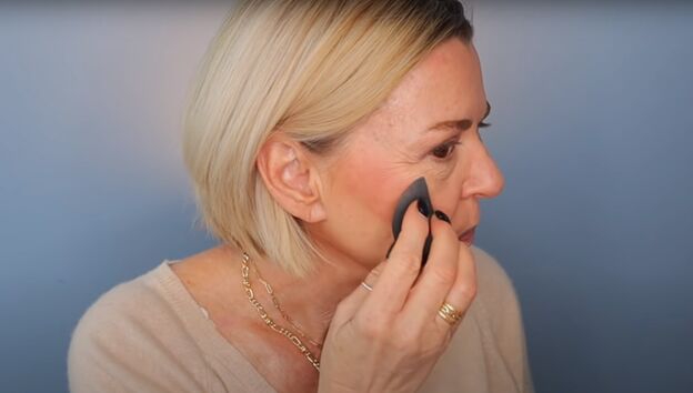 applying fancy makeup for mature skin is the price worth it, Applying cream blush with a damp sponge