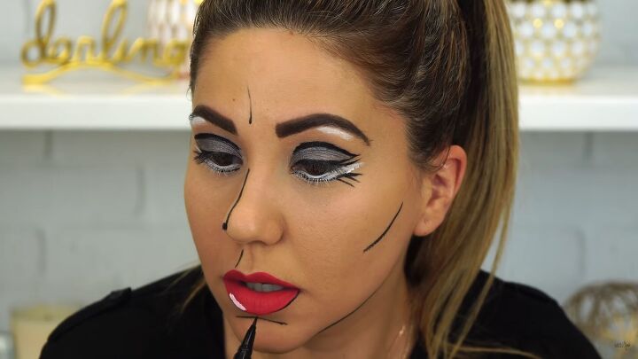 this cartoon pop art makeup look is so easy perfect for halloween, Applying white liner to the face