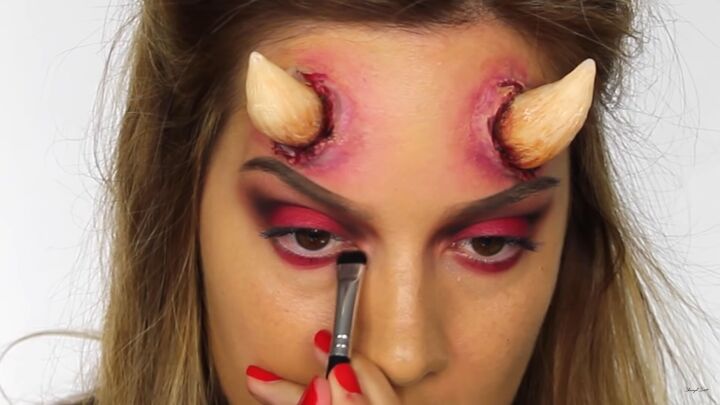 how to do sexy devil makeup for halloween complete with horns, Red eye shadow for sexy devil eye makeup