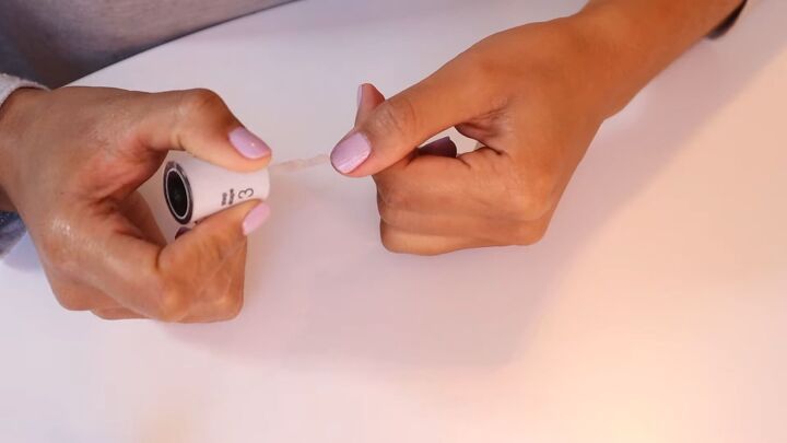 at home gel manicure tips 10 easy steps to the perfect gel manicure, Applying a top coat to gel nails