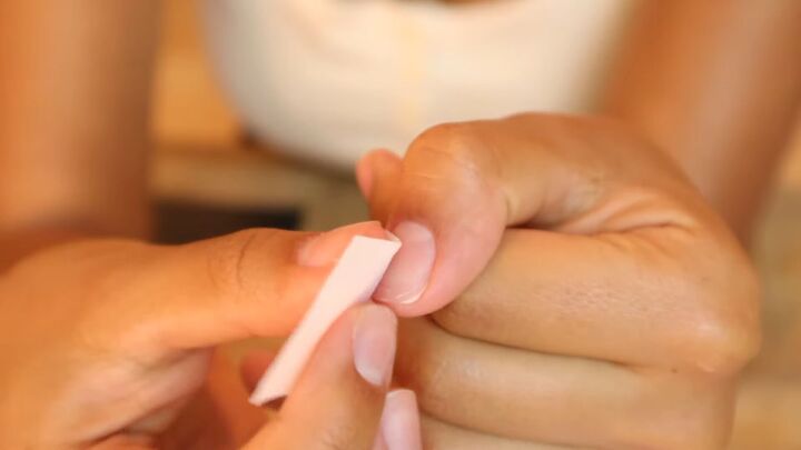 how to apply press on nails with adhesive tabs in 7 simple steps, Cleaning nails with an alcohol wipe