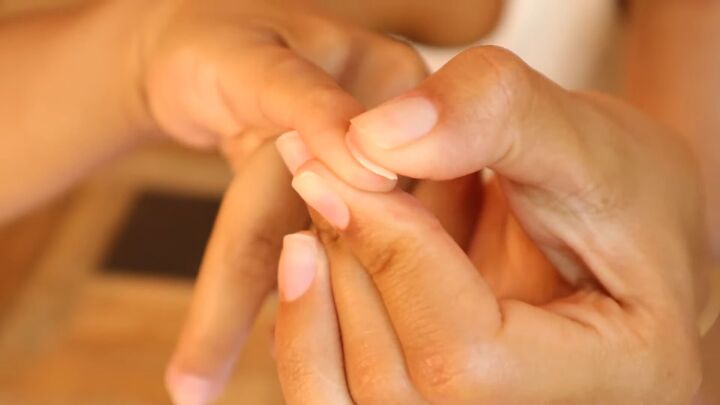 how to apply press on nails with adhesive tabs in 7 simple steps, Pressing the press on nails