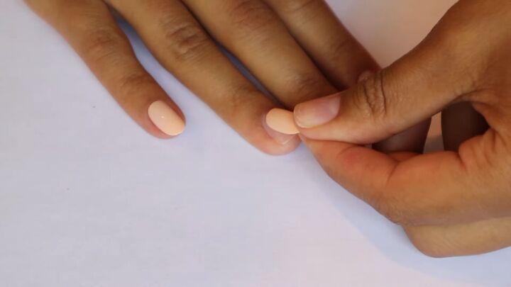 how to apply press on nails with adhesive tabs in 7 simple steps, How to use press on nails