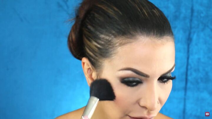 perfect the sultry eye look with this easy smokey eye palette tutorial, Applying blush to cheekbones