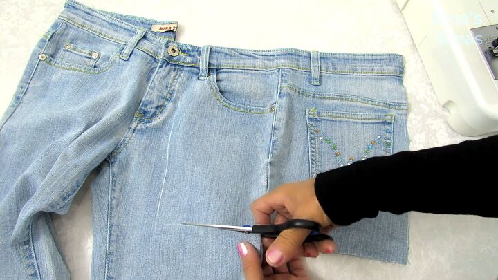 how to make a jean pocket purse in 6 simple steps, Cutting the pocket out of the denim jeans
