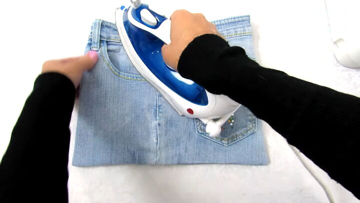 how to make a jean pocket purse in 6 simple steps, Pressing the DIY purse from old jeans
