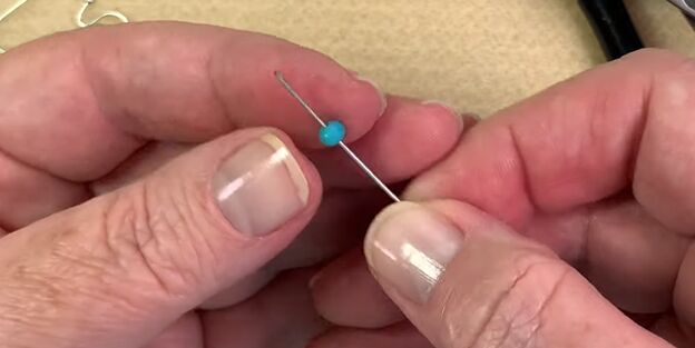 how to make quick easy chain earrings at home, Threading beads onto the headpin