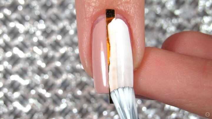 10 easy peasy nail art designs for beginners step by step tutorial, Applying white nail polish to half the nail