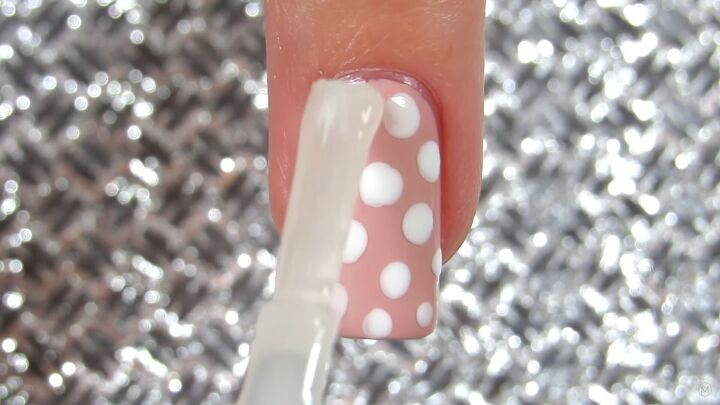 10 easy peasy nail art designs for beginners step by step tutorial, Applying a top coat to the design
