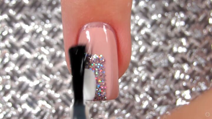 10 easy peasy nail art designs for beginners step by step tutorial, Applying a clear top coat over the nail art