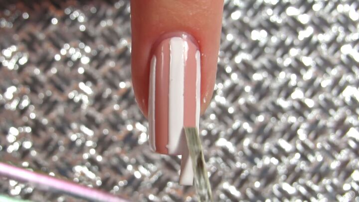 10 easy peasy nail art designs for beginners step by step tutorial, Removing the nail tape with tweezers