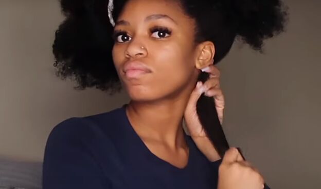 how to do perfect mini twists on natural hair in 6 simple steps, Applying curl sealer to hair for moisture