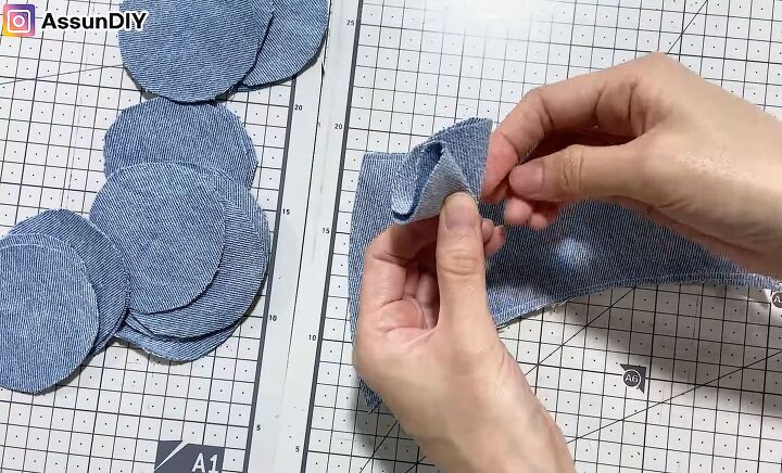 cute diy slippers tutorial how to make slippers from old jeans, Making the denim flower for the DIY slippers