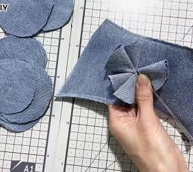 cute diy slippers tutorial how to make slippers from old jeans, Sewing the flower onto the DIY slippers