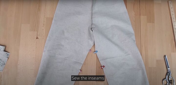 how to easily make cute comfy pajama pants without a pattern, Pinning the inseams ready to sew