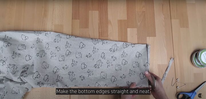 how to easily make cute comfy pajama pants without a pattern, Trimming the bottom edges ready to serge