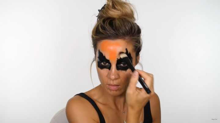 how to do creepy pumpkin makeup for halloween using cheap face paint, Creating pumpkin makeup for Halloween