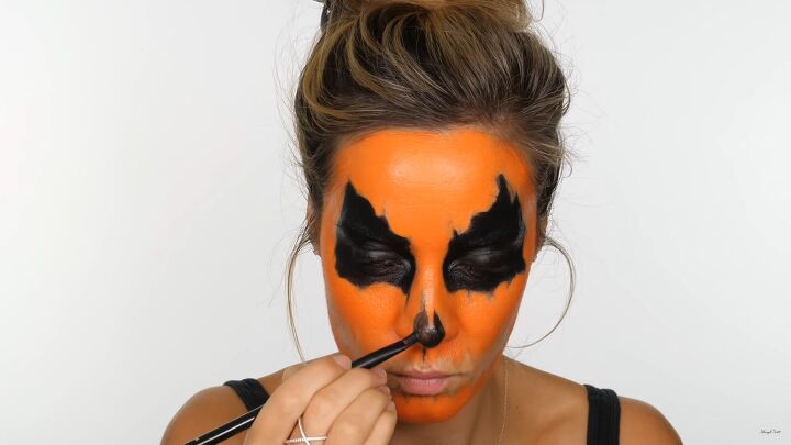 how to do creepy pumpkin makeup for halloween using cheap face paint, How to do scary DIY pumpkin makeup