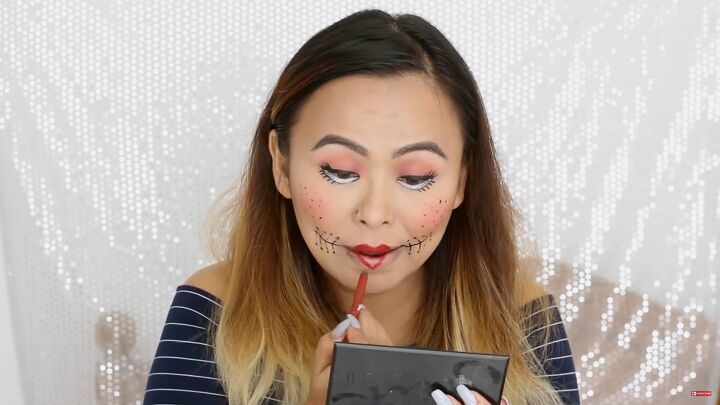 5 last minute diy easy halloween costumes you can do with makeup, Making a cupid s bow with red lipstick