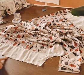 how to sew cute diy halloween pajamas perfect for scary movie nights, Pinning in place ready to sew