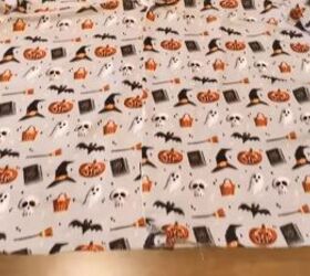 how to sew cute diy halloween pajamas perfect for scary movie nights, Hemming the bottom of the pajama shirt
