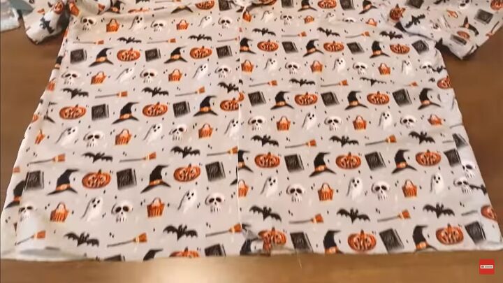 how to sew cute diy halloween pajamas perfect for scary movie nights, Hemming the bottom of the pajama shirt