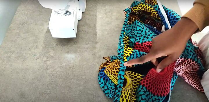 how to make an ankara dress with a pretty ruffle hem sleeves, Sewing the neckline of the DIY Ankara dress